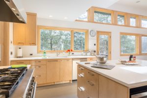 Bright and airy kitchen with natural maple cabinets