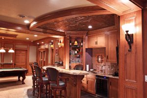 Lower level bar with quarter-sawn oak cabinets