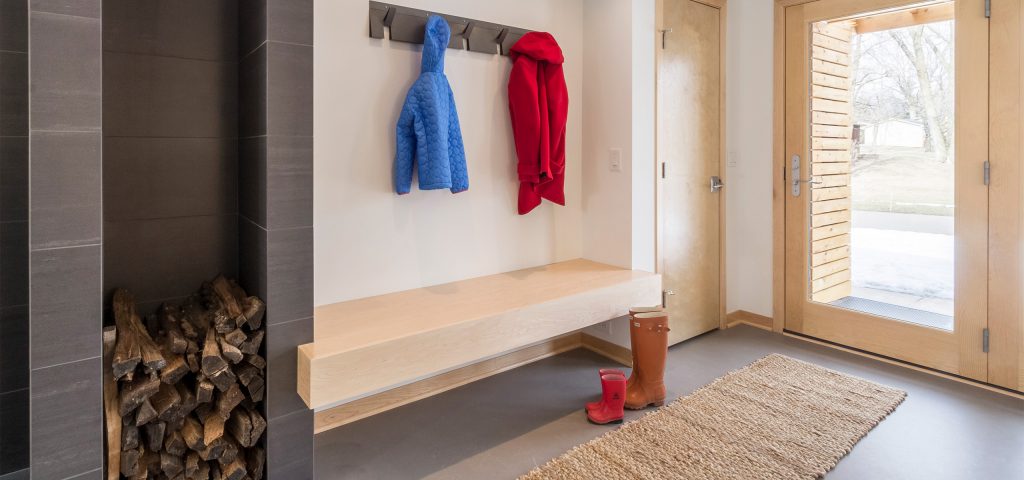 Mud room with maple bench and board and hooks